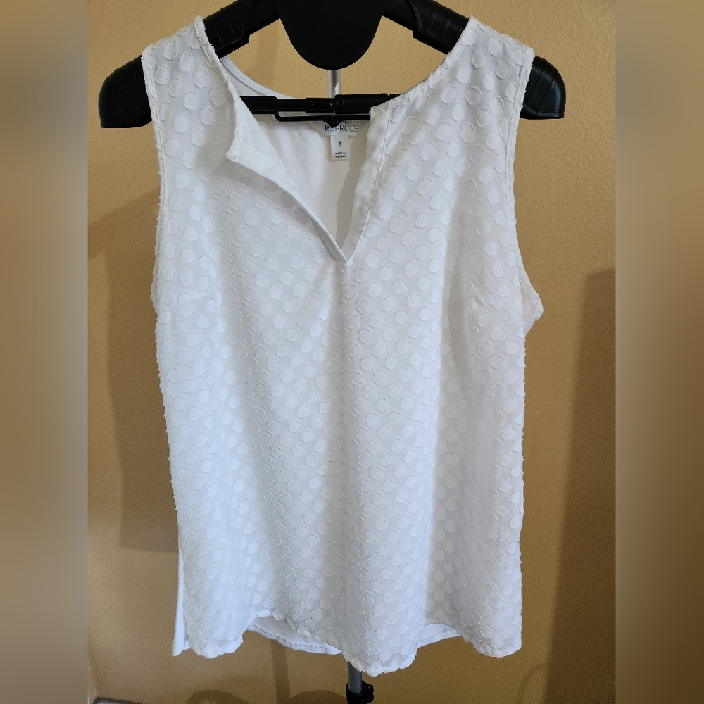 White sleeveless blouse